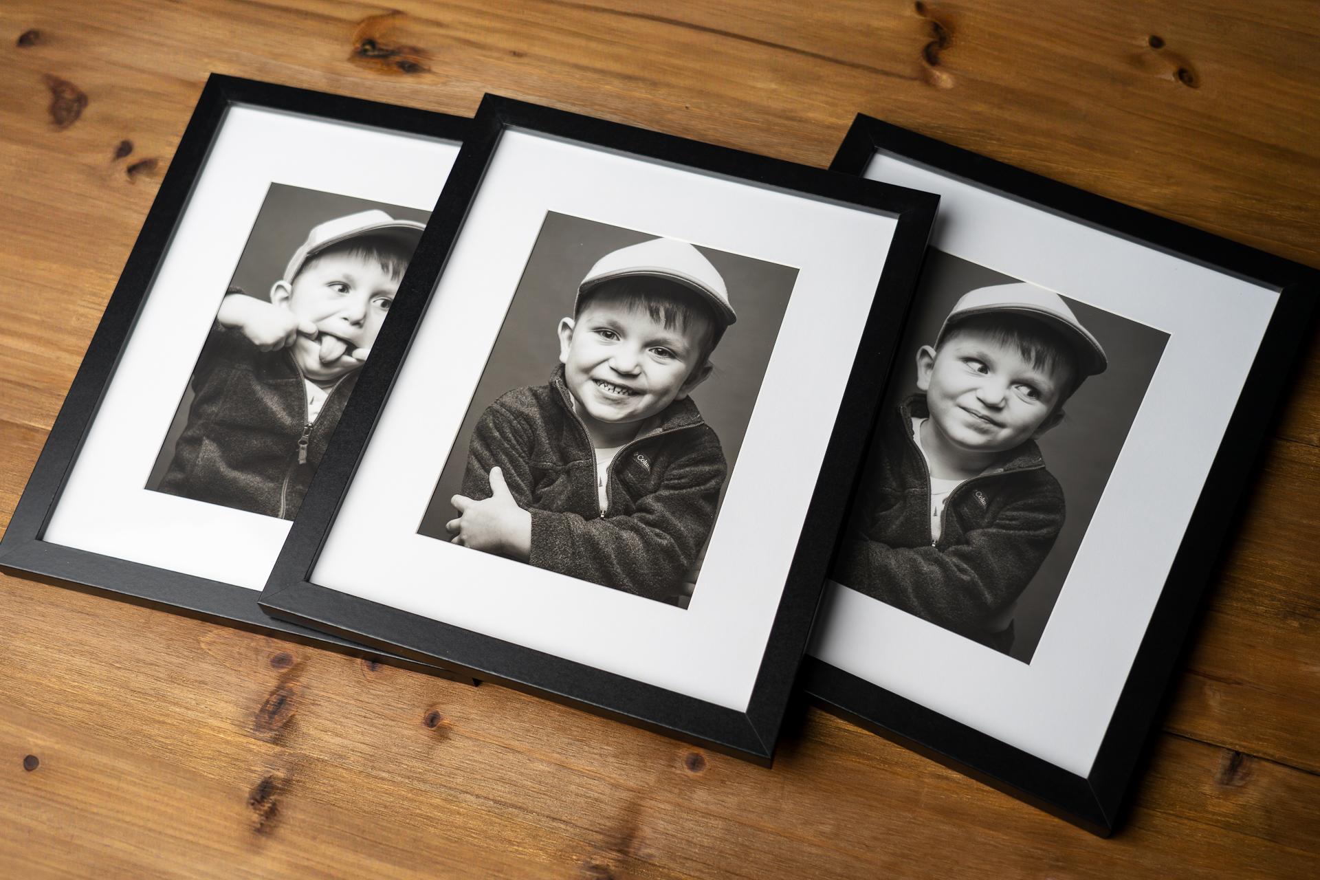 Three framed portraits of a toddler